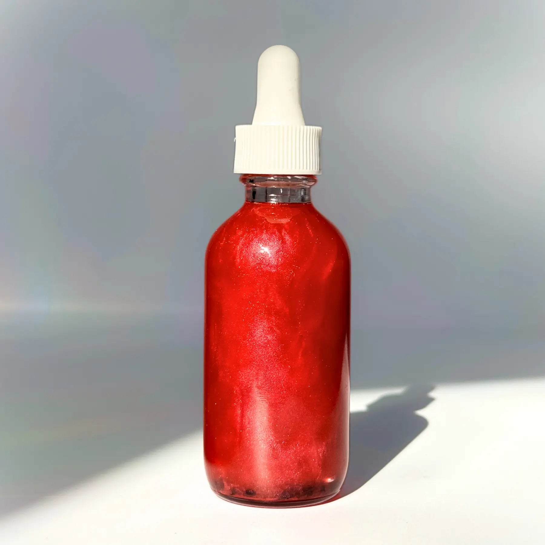 Blood Magic Shimmer Oil Notes of: Orange, Clove & Incense