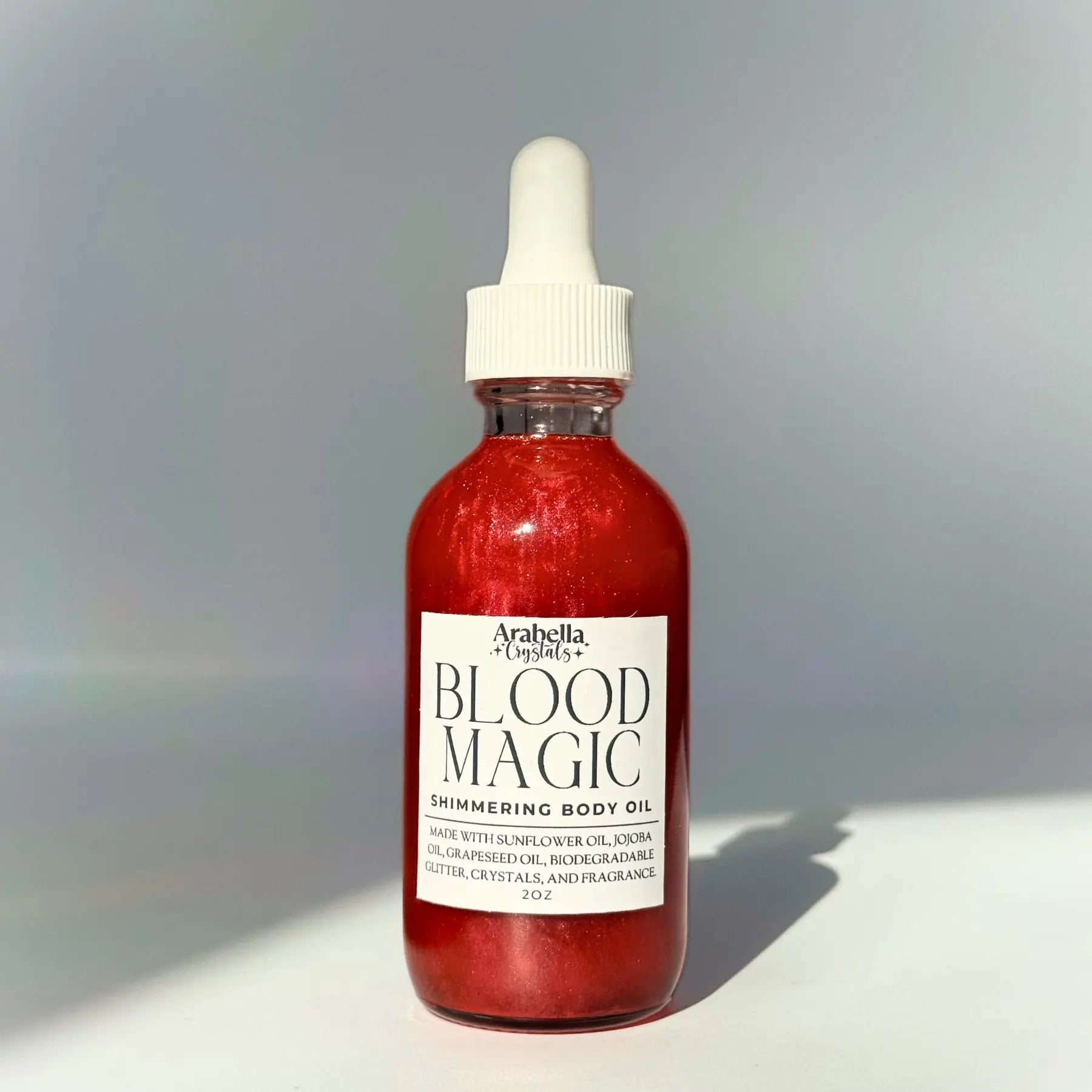 Blood Magic Shimmer Oil Notes of: Orange, Clove & Incense