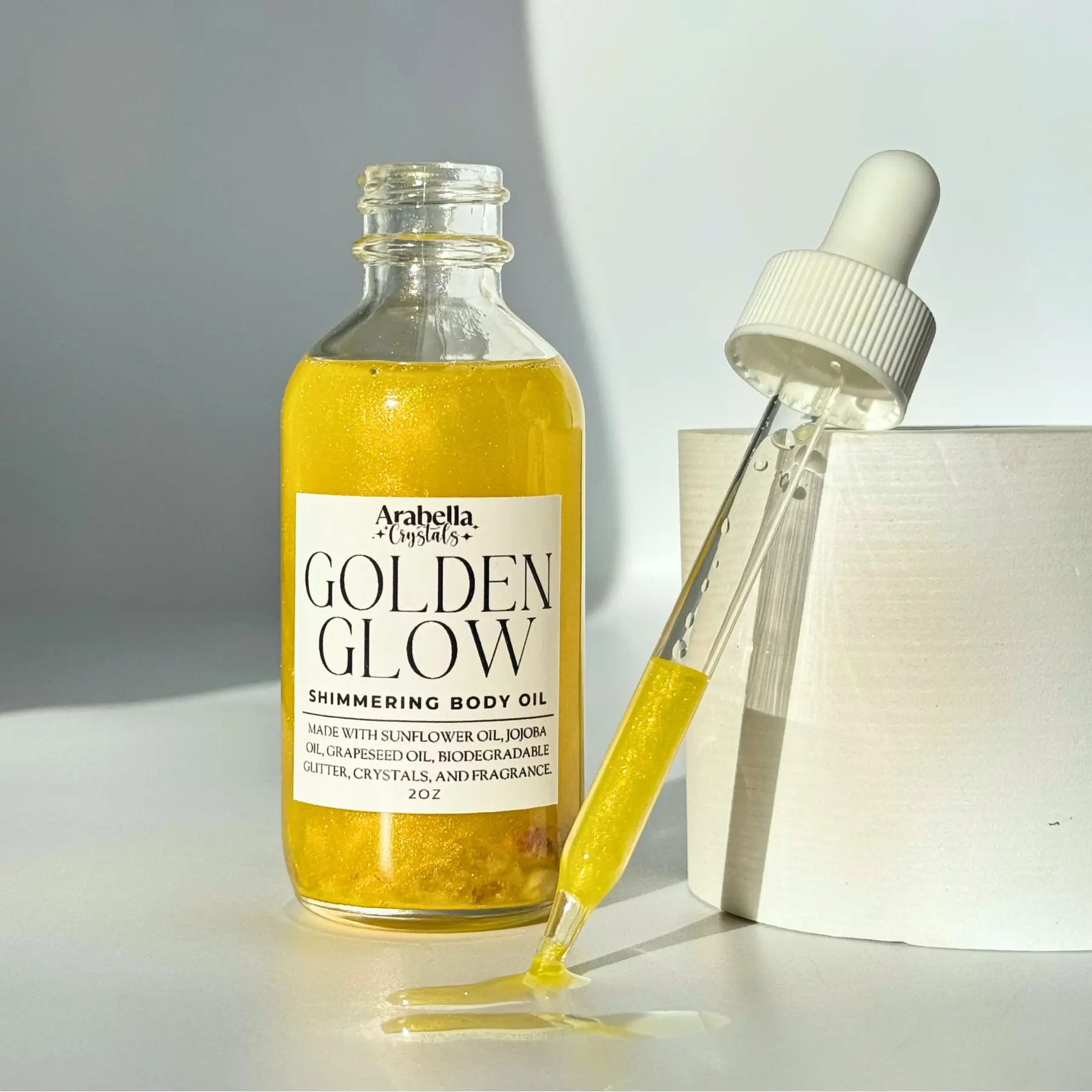 Golden Glow Shimmer Oil Notes of: Bergamot, Orange Blossom, Sandalwood