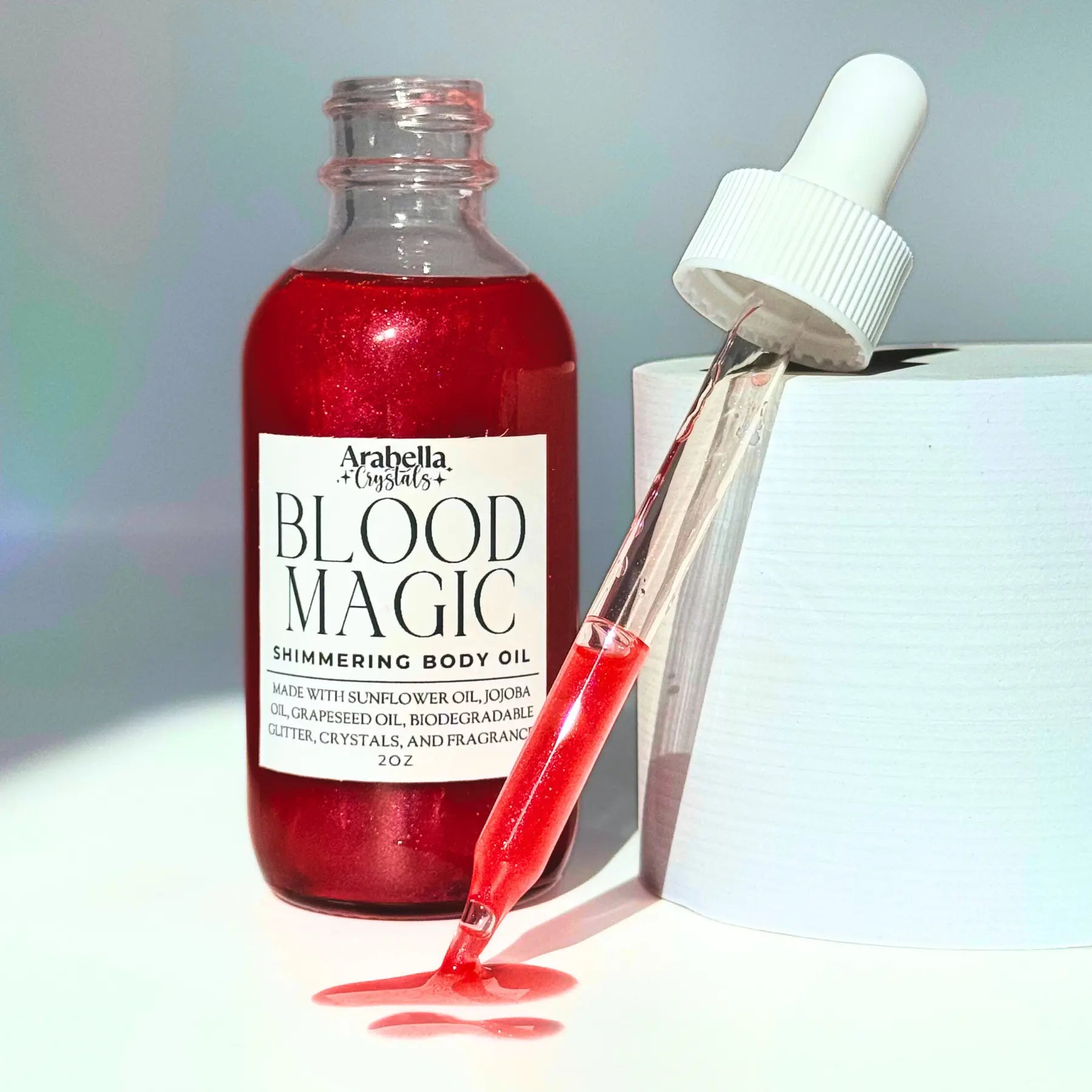 Blood Magic Shimmer Oil Notes of: Orange, Clove & Incense