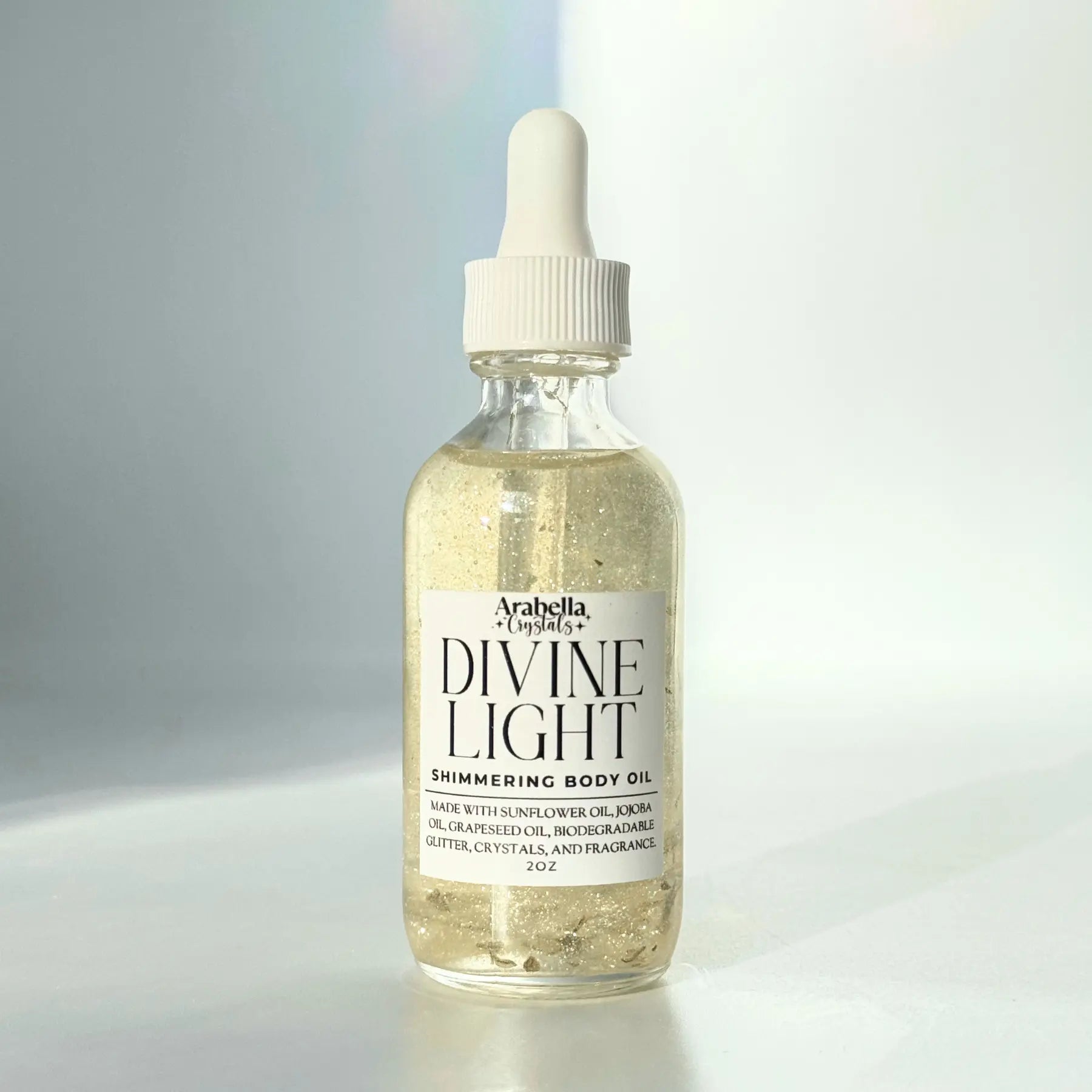 Divine Light Shimmer Oil Notes of: Lemon, Bergamot, White Tea