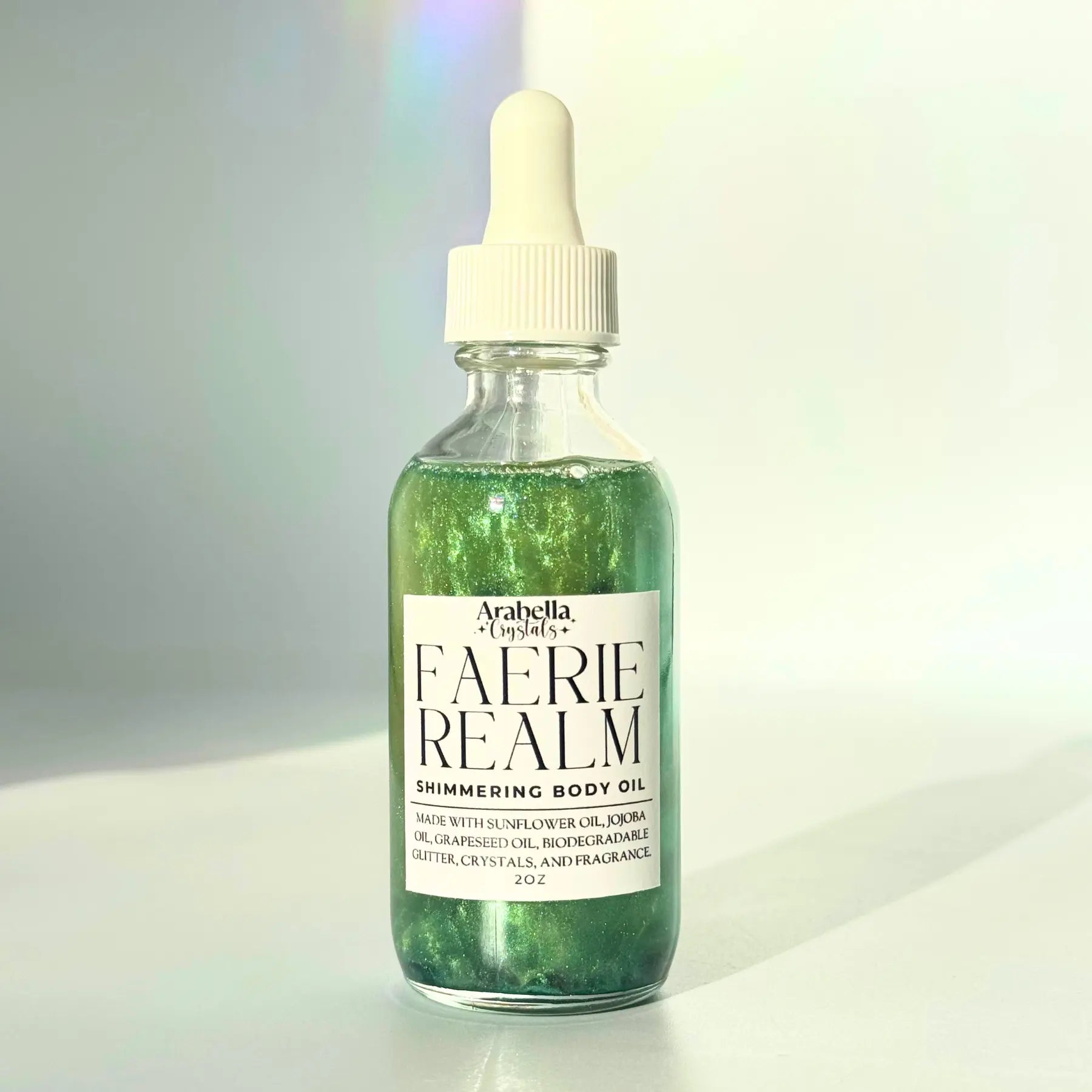 Faerie Realm Shimmer Oil Notes of: Geranium, Violet, Saffron, Moss