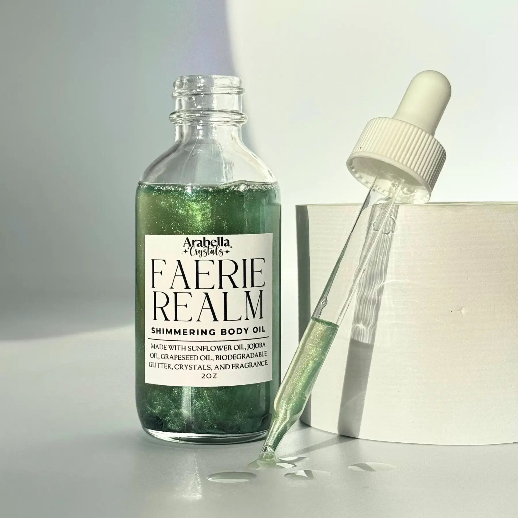 Faerie Realm Shimmer Oil Notes of: Geranium, Violet, Saffron, Moss