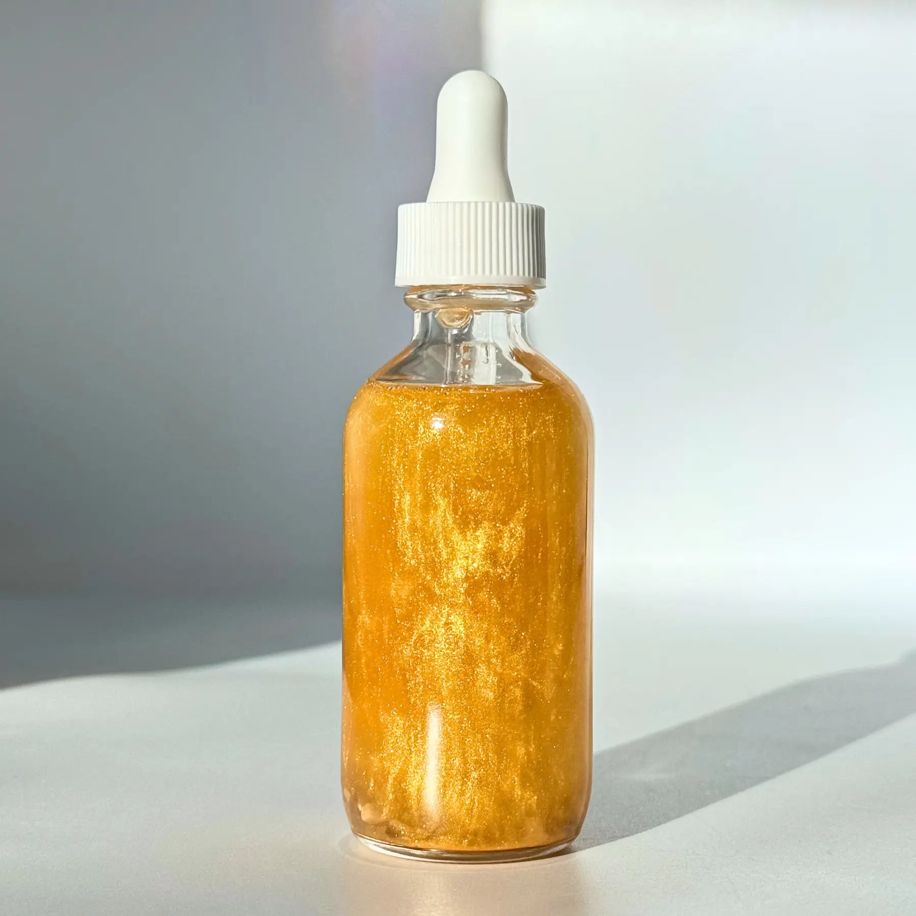 Full Moon Shimmer Oil Notes of: Lemon, Turmeric & Milk