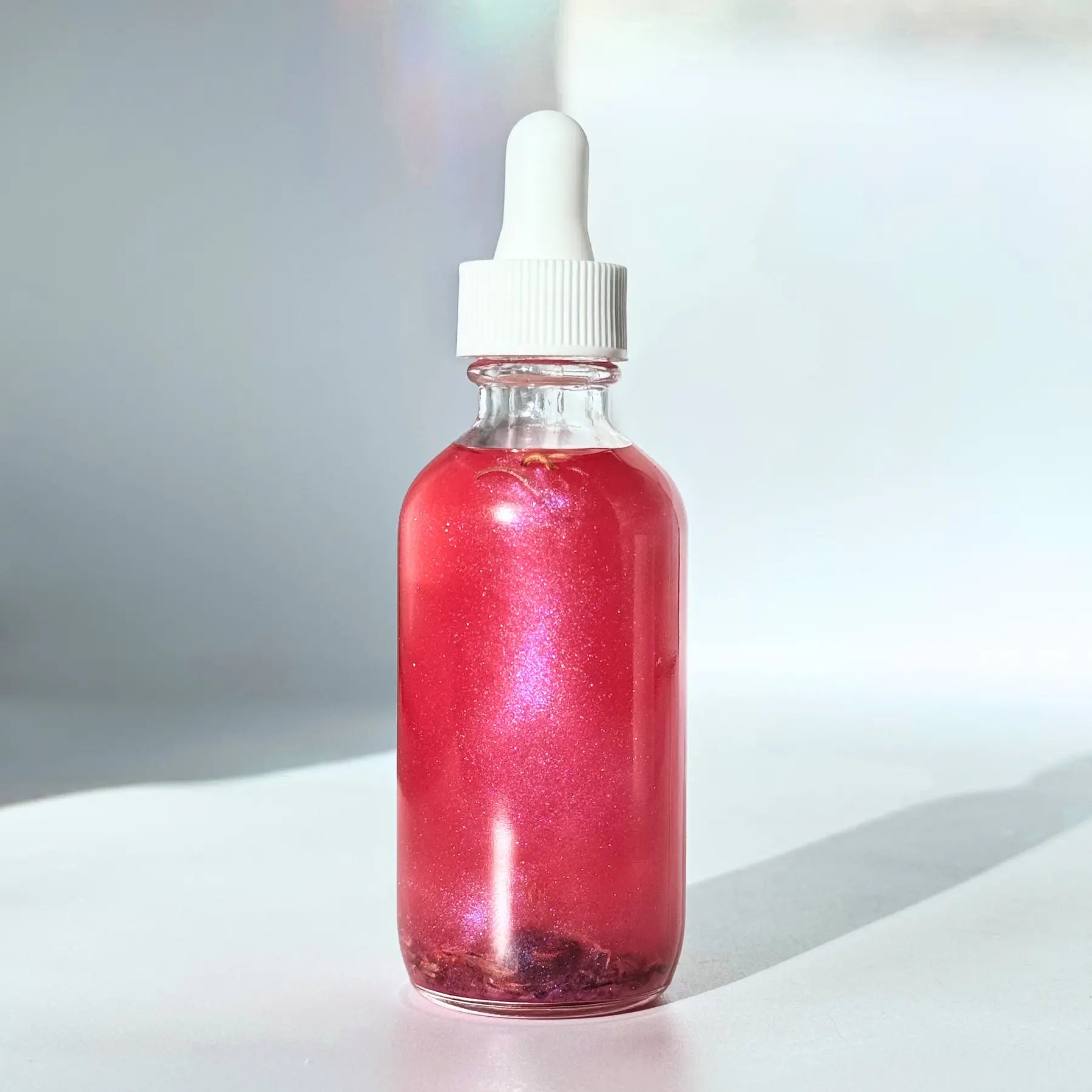 Love Potion Shimmer Oil Notes of: Plumeria, Jasmine, White Tea