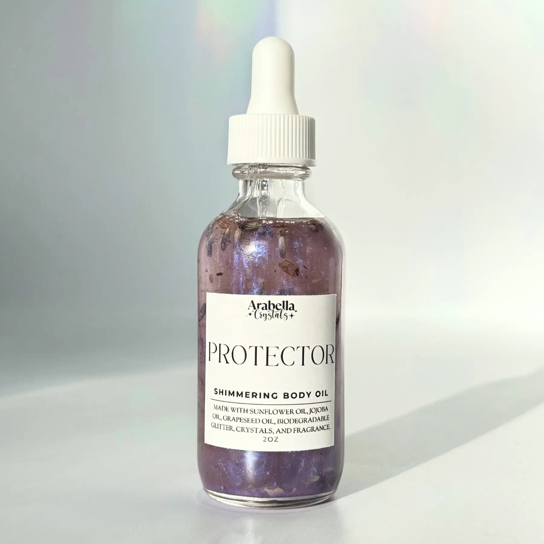 Protector Shimmer Oil Notes of: Lavender, Sage, Cedar