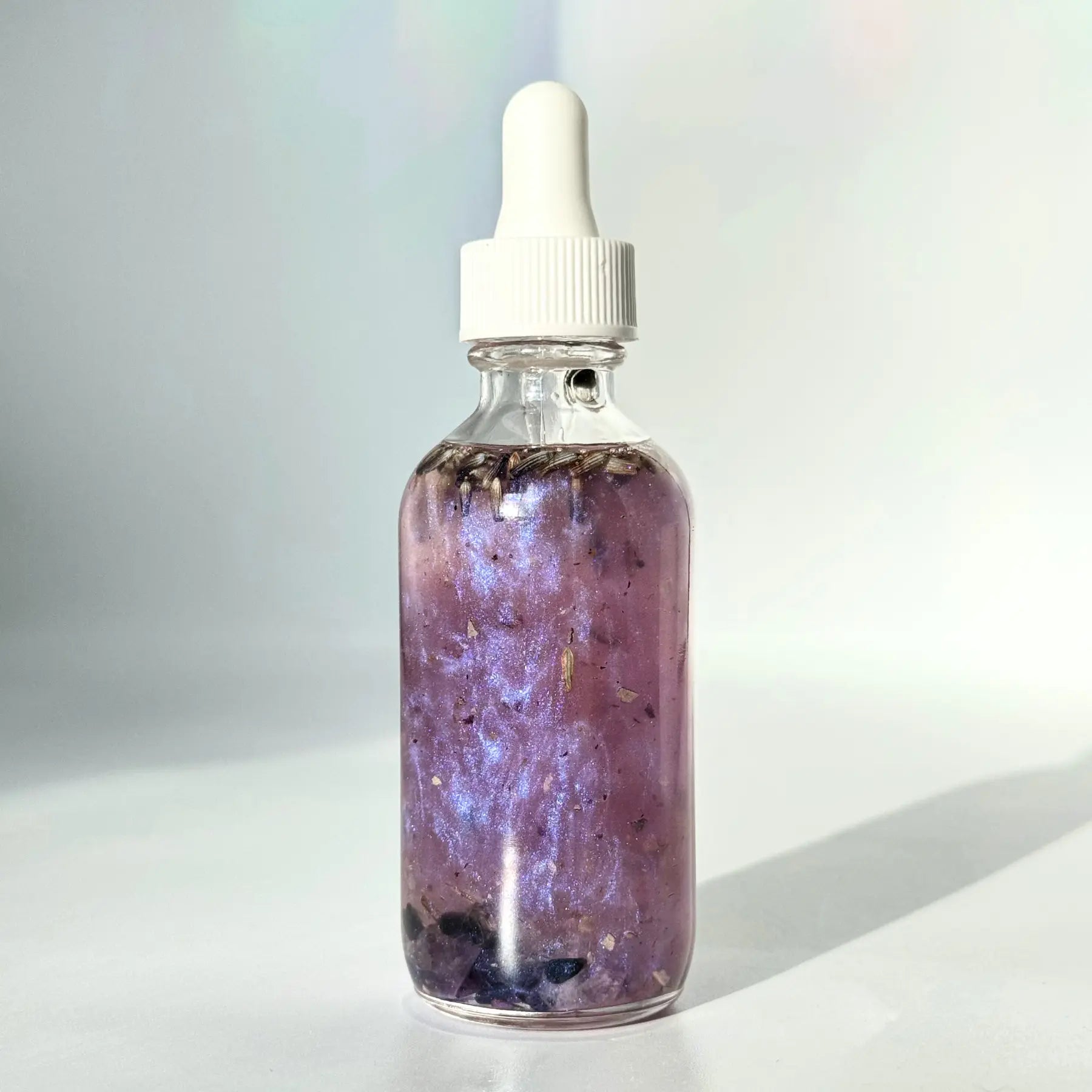Protector Shimmer Oil Notes of: Lavender, Sage, Cedar