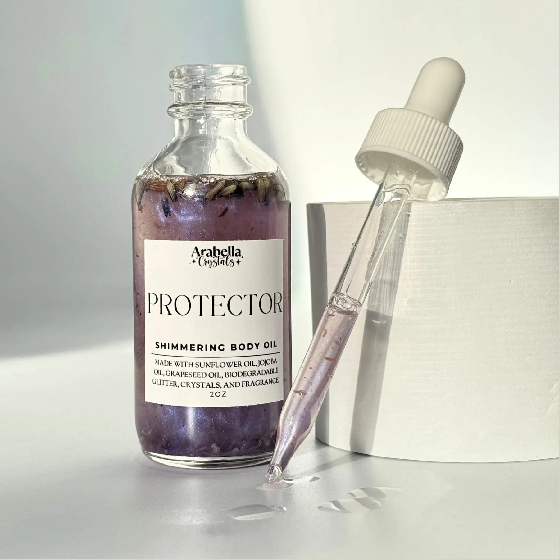 Protector Shimmer Oil Notes of: Lavender, Sage, Cedar